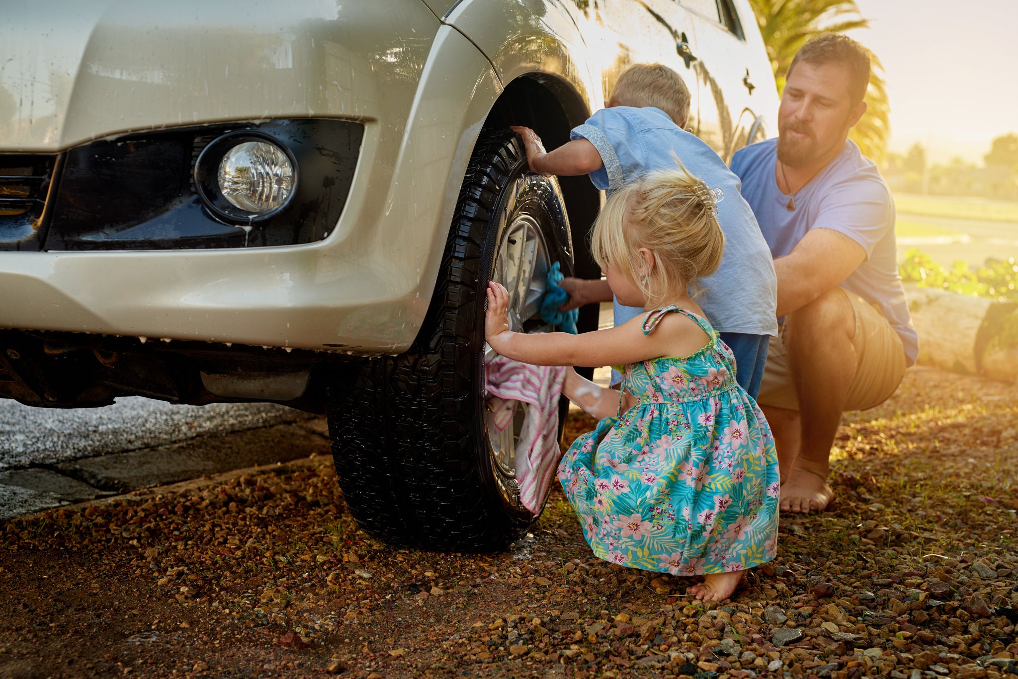 Uniroyal - Shot of a family washing their car together