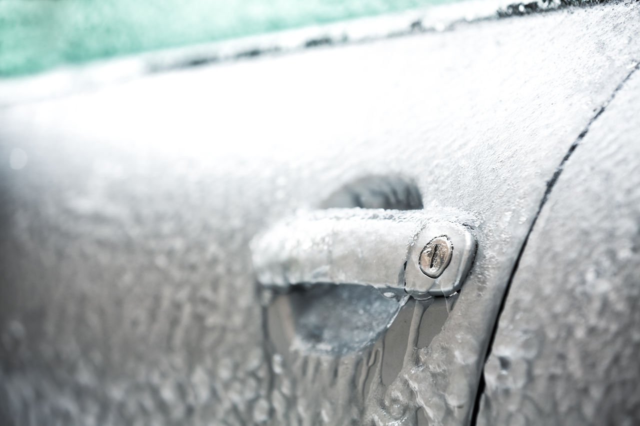 Uniroyal - Frozen keylock of a car with icicles.