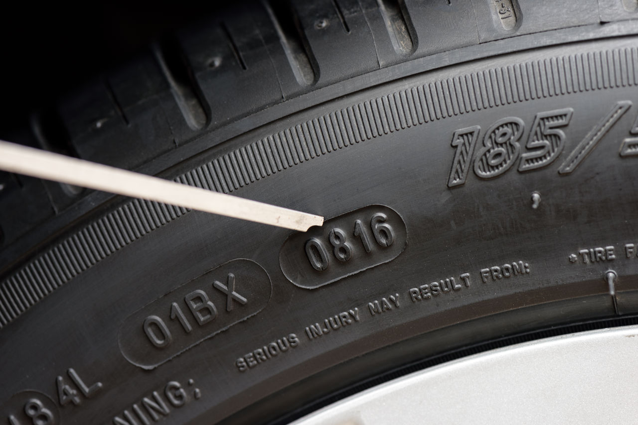 Uniroyal - Closeup details of car tire, sidewall information