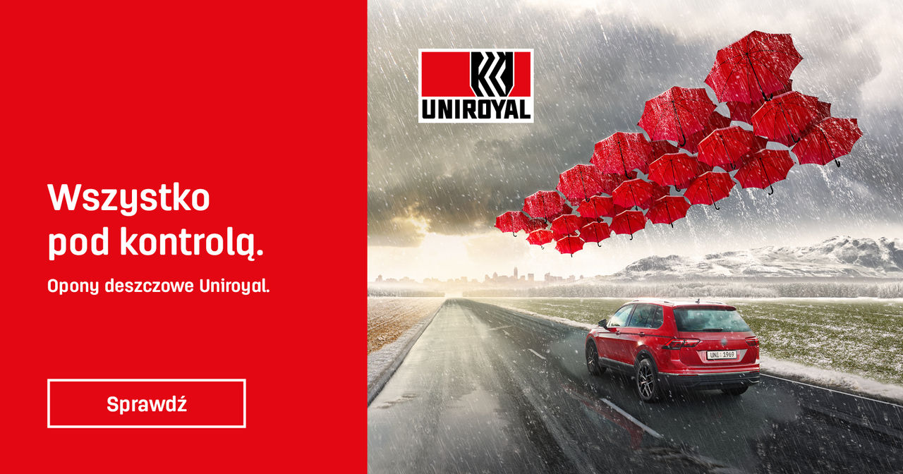 Uniroyal RainSport 5 tyre on a red car driven by a male person in a city